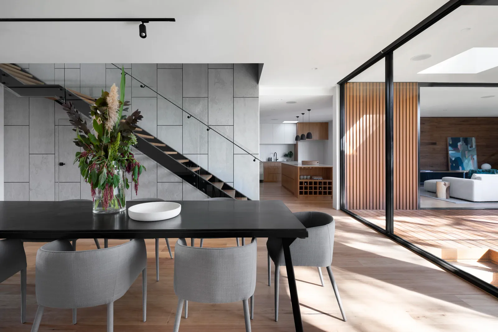 Premium interior material planning with warm architectural flooring finishes.