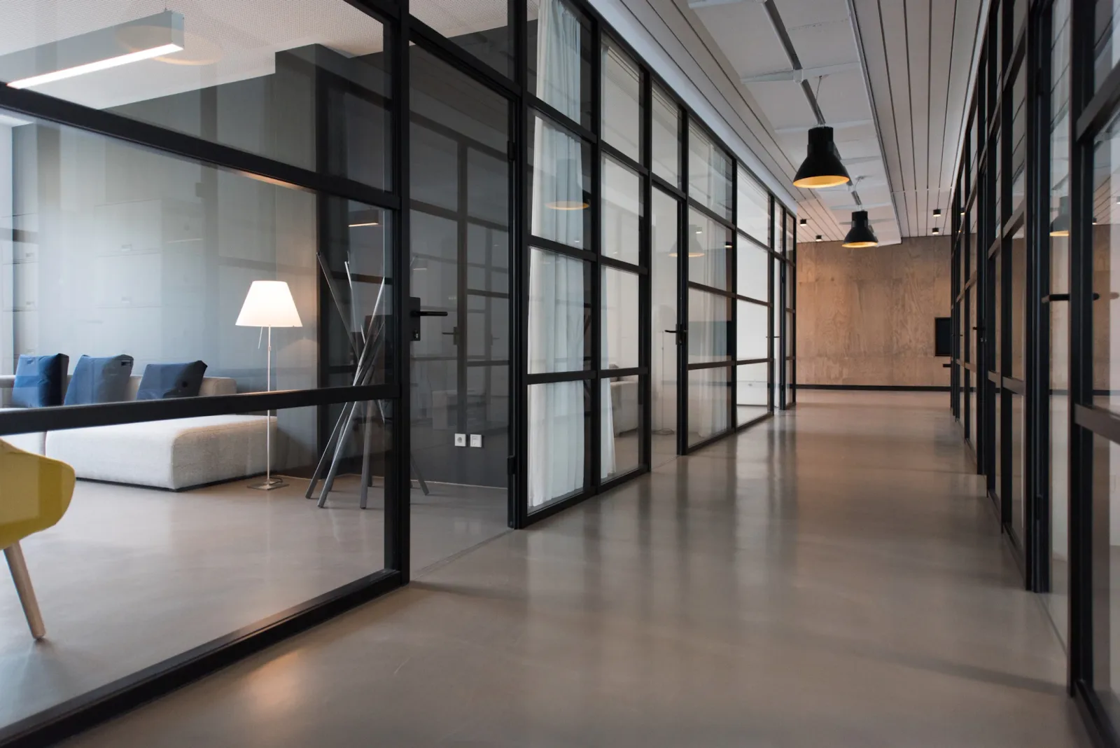 International project team reviewing architectural plans in a modern workspace.
